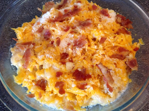 crack n cheese into the oven